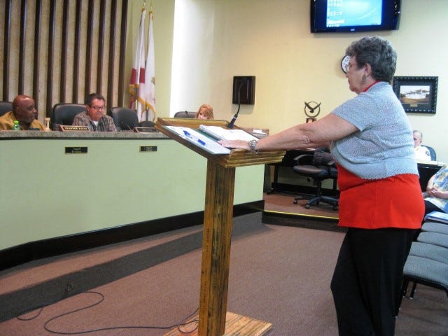 City Clerk Betsy Roy answers questions about the proposed 2015-16 budget from members of the City Council Thursday evening.