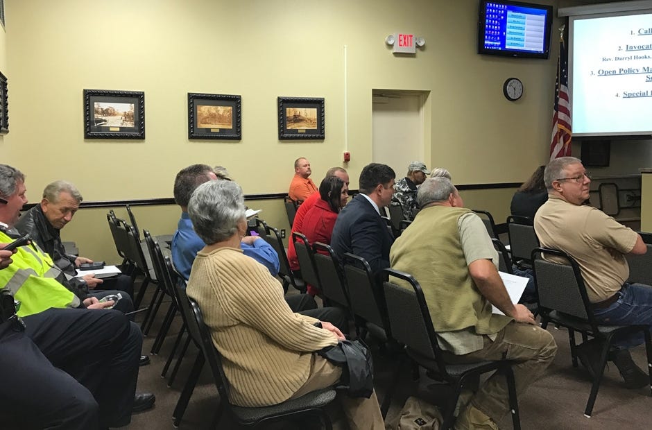 Citizens begin to fill one half of the room during Monday's City Council meeting. [MARK JUDSON/NEWS BULLETIN]