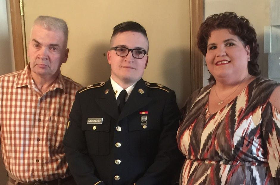 U.S. Army Specialist Nathaniel Castonguay, center, stands with his parents, James and Gail, who attended his graduation March 1 in Texas. [Special to the News Bulletin]