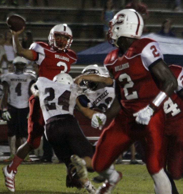 Crestview quarterback Rusty Moorer (left) and receiver Marquis McClain will try to lead the Crestview football team to its first winning season since 2010.