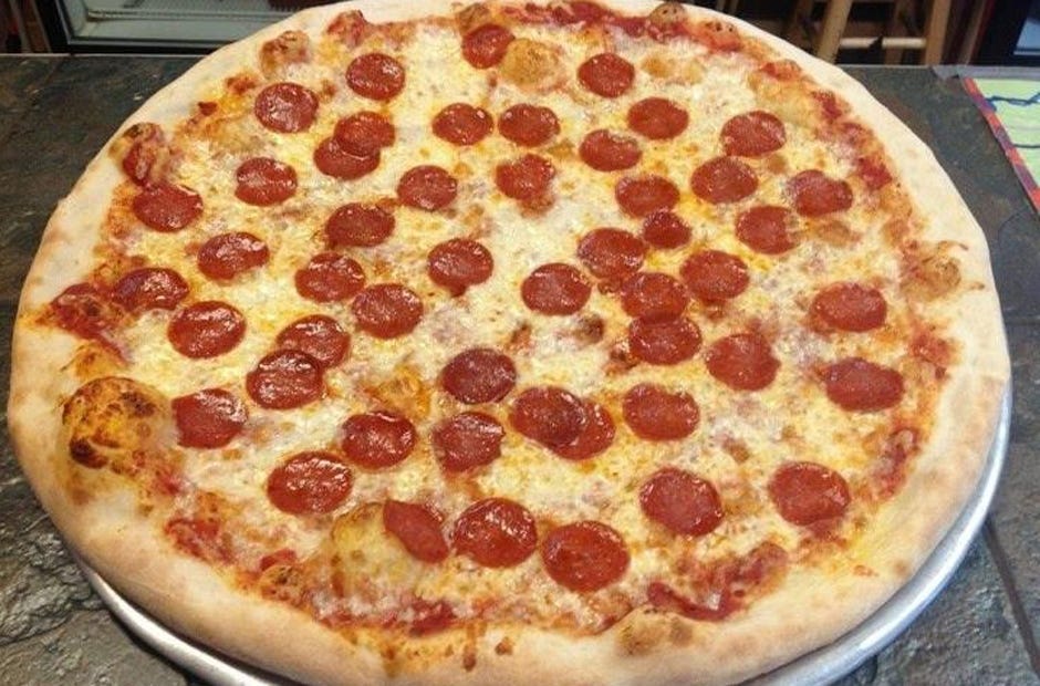 This pepperoni pizza comes from New York's Famous Pizza and Pasta, which makes, rolls and tosses its own dough. [PHOTO COURTESY OF NEW YORK'S FAMOUS PIZZA AND PASTA]