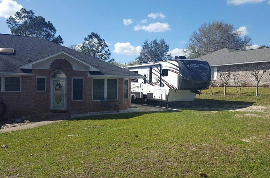 The camper on Andrew Rencich's property was deemed a violation of city code and could cost him up to $500 per day if not removed. [MARK JUDSON/NEWS BULLETIN]