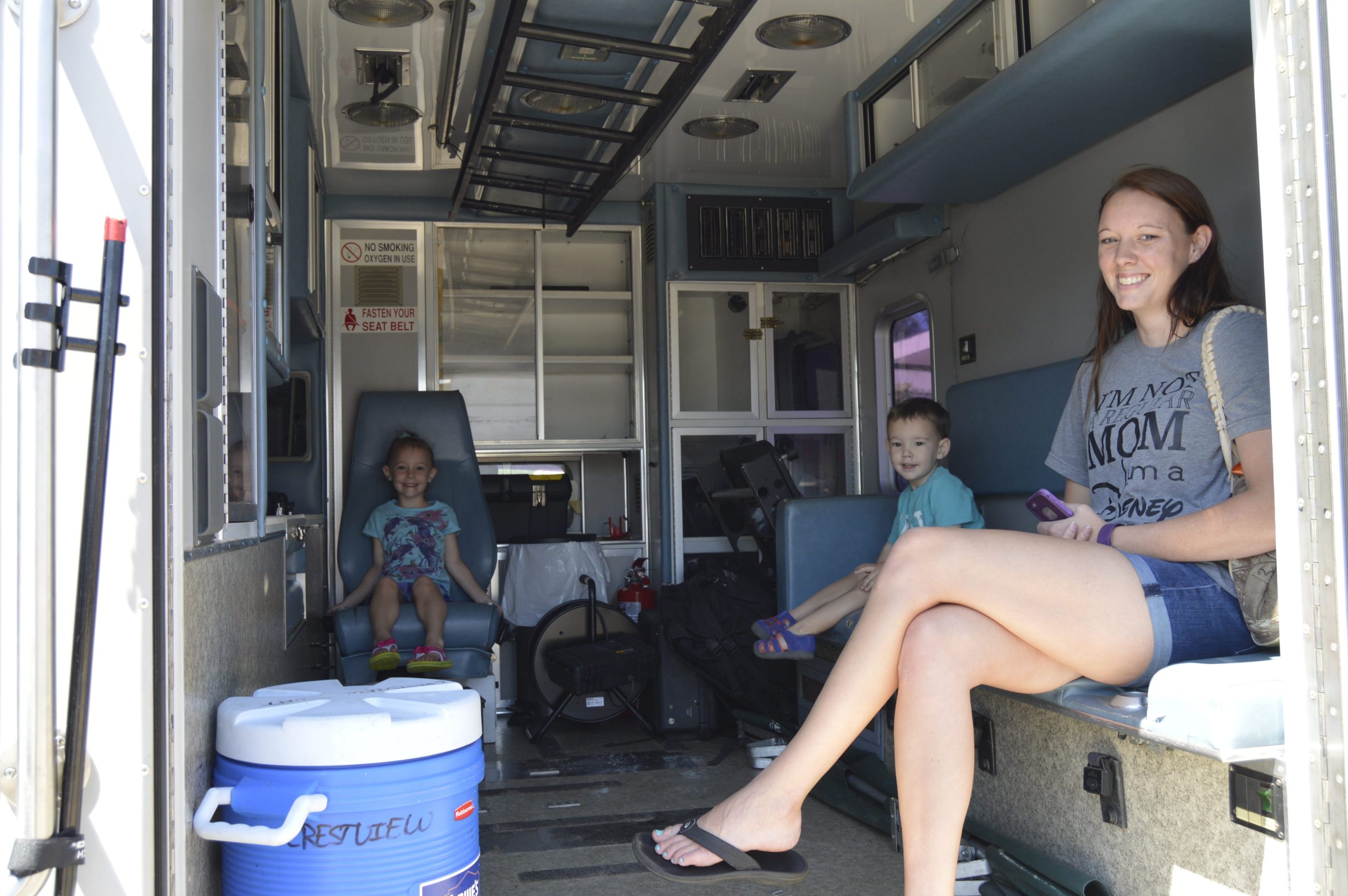 Riley, Grant and Jordan Taylor get a look inside the Crestview Police Department's S.W.A.T. vehicle. [ALICIA ADAMS/NEWS BULLETIN]