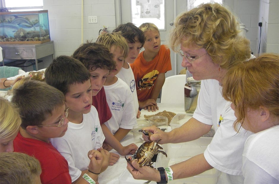 Florida 4-H Science Coordinator Karen Blyler teaches a marine science lesson about crabs at Camp Timpoochee. [Okaloosa 4-H | Special to the News Bulletin]