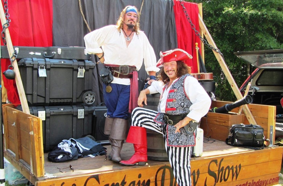 Capt. Davy and his mate prepare to perform "magic, music and mayhem" during the Elks Lodge 2624 Exceptional Children's Day June 11, 2016 in Crestview. He and his crew will return for the May 13 event this year. [Special to the News Bulletin]