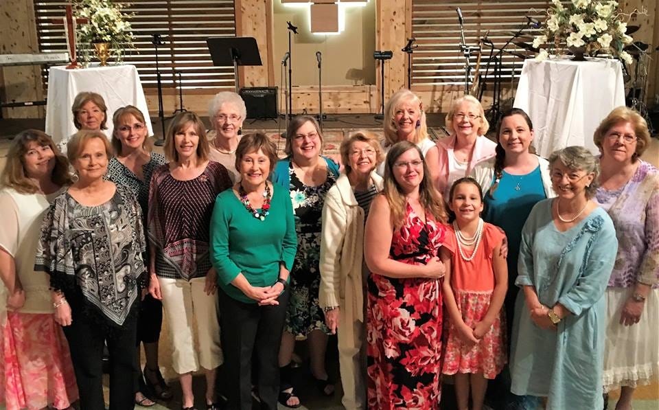 First United Methodist Church of Crestview held their annual Mother's Day tea on Saturday, May 6, in the Crossroads Center. Pictured are volunteers and attendees. [Special to the News Bulletin]
