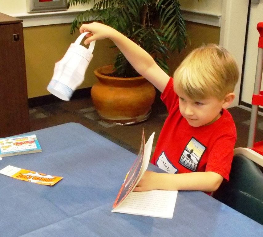 Caleb, 5, made this paper lantern during a recent Storytime activity at the Crestview Public Library. Storytime classes integrate stories and craft-making for 3- to 5-year-olds.