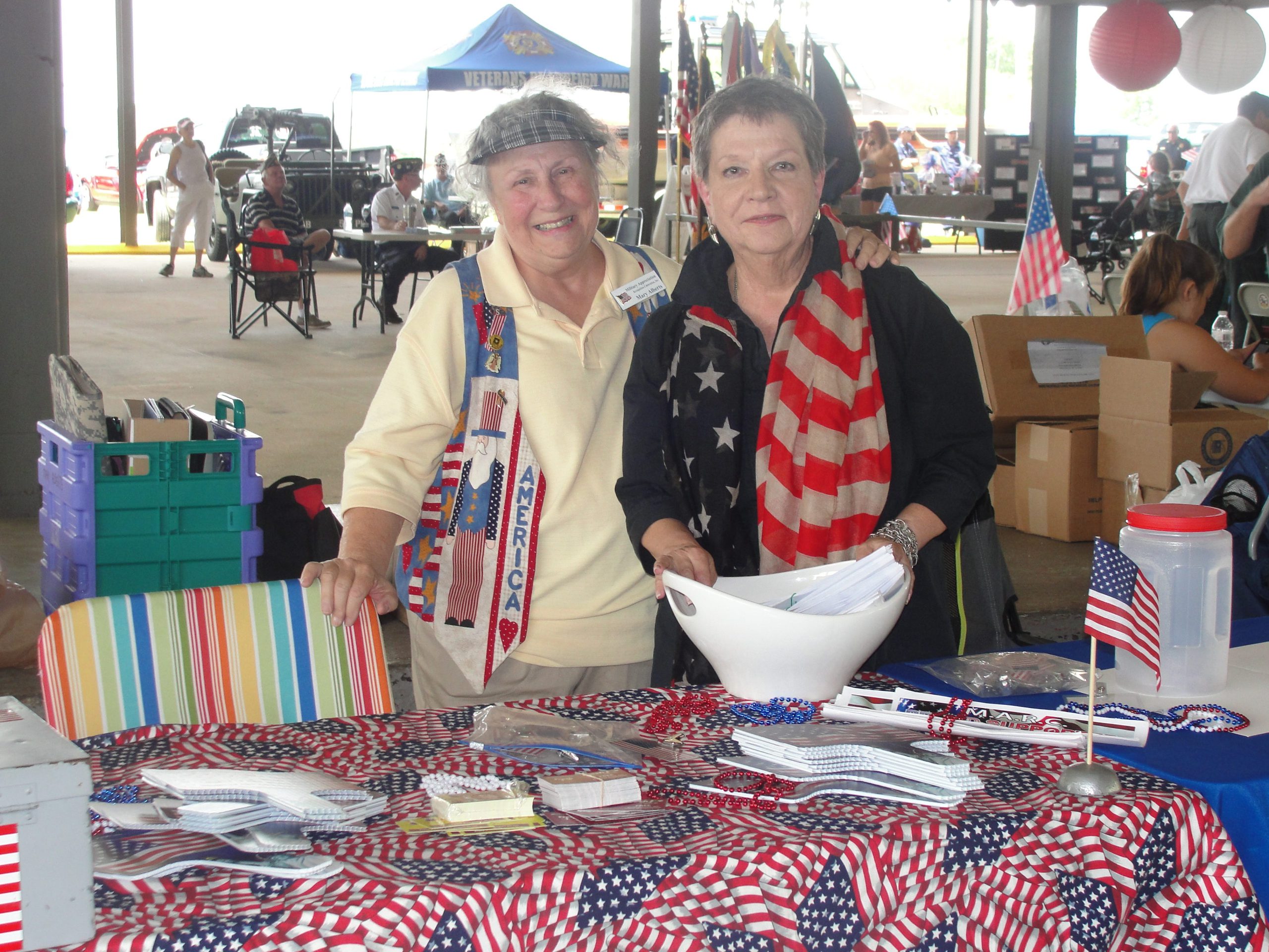 Mary Alberts and Rae Schwartz, with Military Appreciation Recognition Celebration Inc., show their support for area military. [SAMANTHA LAMBERT | News Bulletin]