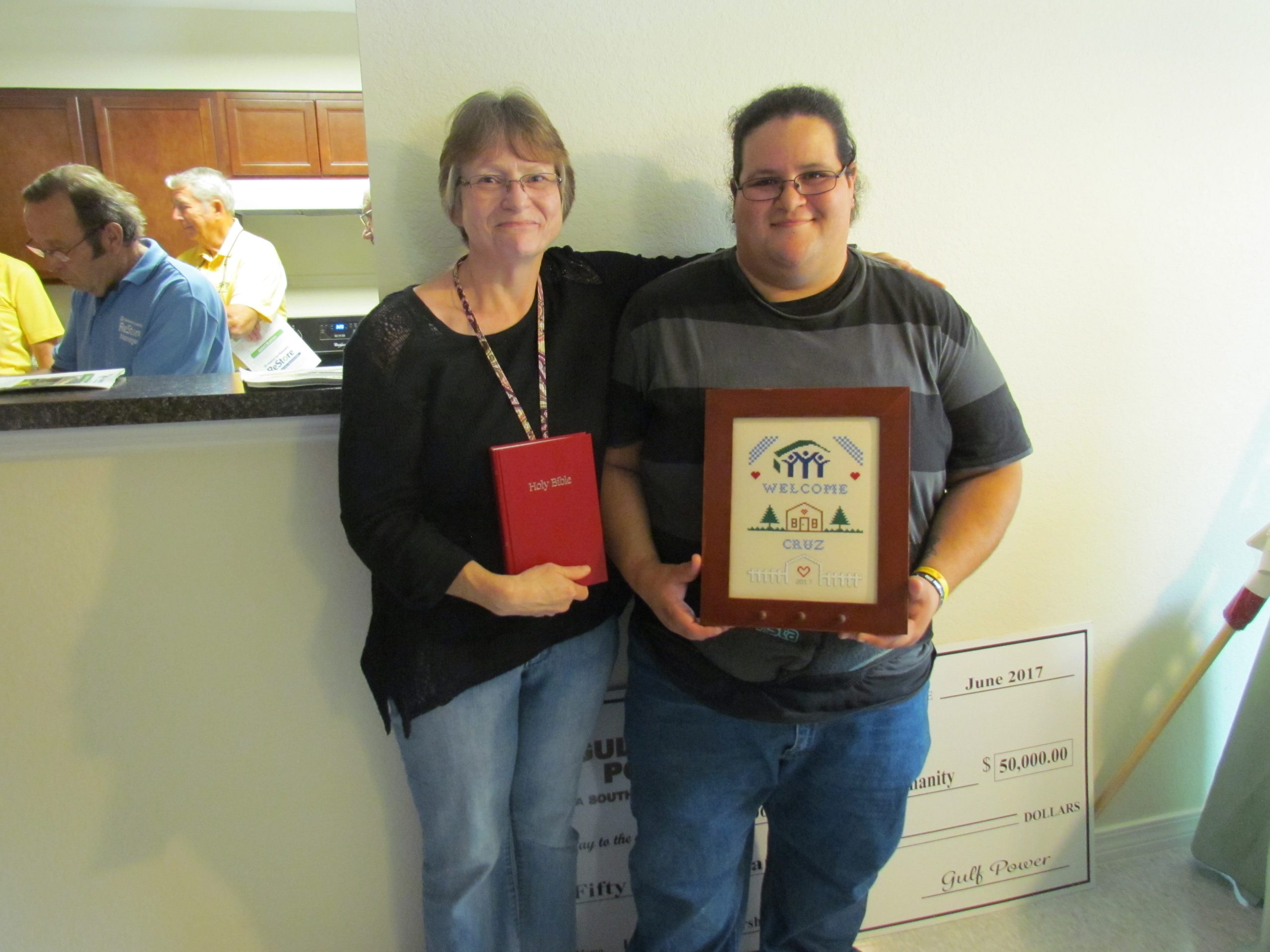 Rosalind Cruz and her mother, Carol, are the proud owners of a new home in Crestview after applying with Habitat for Humanity. [ALICIA ADAMS/NEWS BULLETIN]