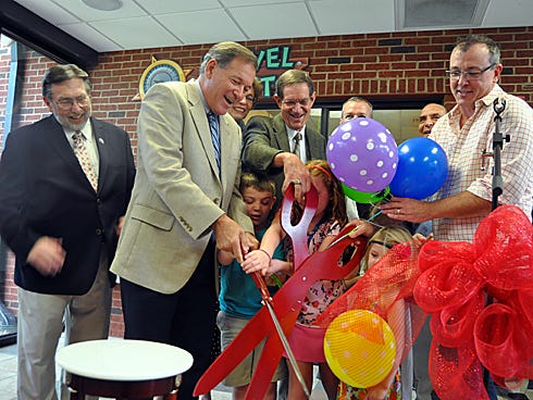 Pictured, from left, are Crestview Mayor David Cadle; the Rev. Rurel Ausley, Niceville UMC's lead pastor; project manager Terry Harpool; and St. Mark UMC lead pastor Brice Early.