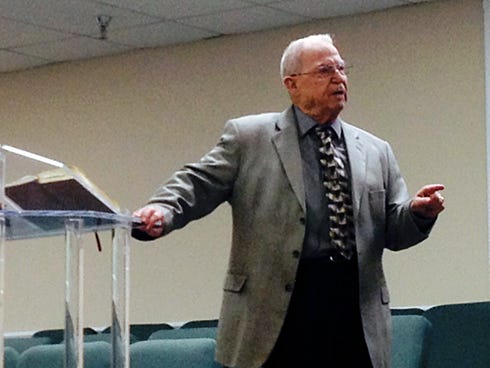 New Beginnings Church Pastor Raymond Williams, 82, preaches from the pulpit during a Sunday morning service. Williams, who has served Crestview's area faithful the past 39 years, plans to retire from full-time ministry.
