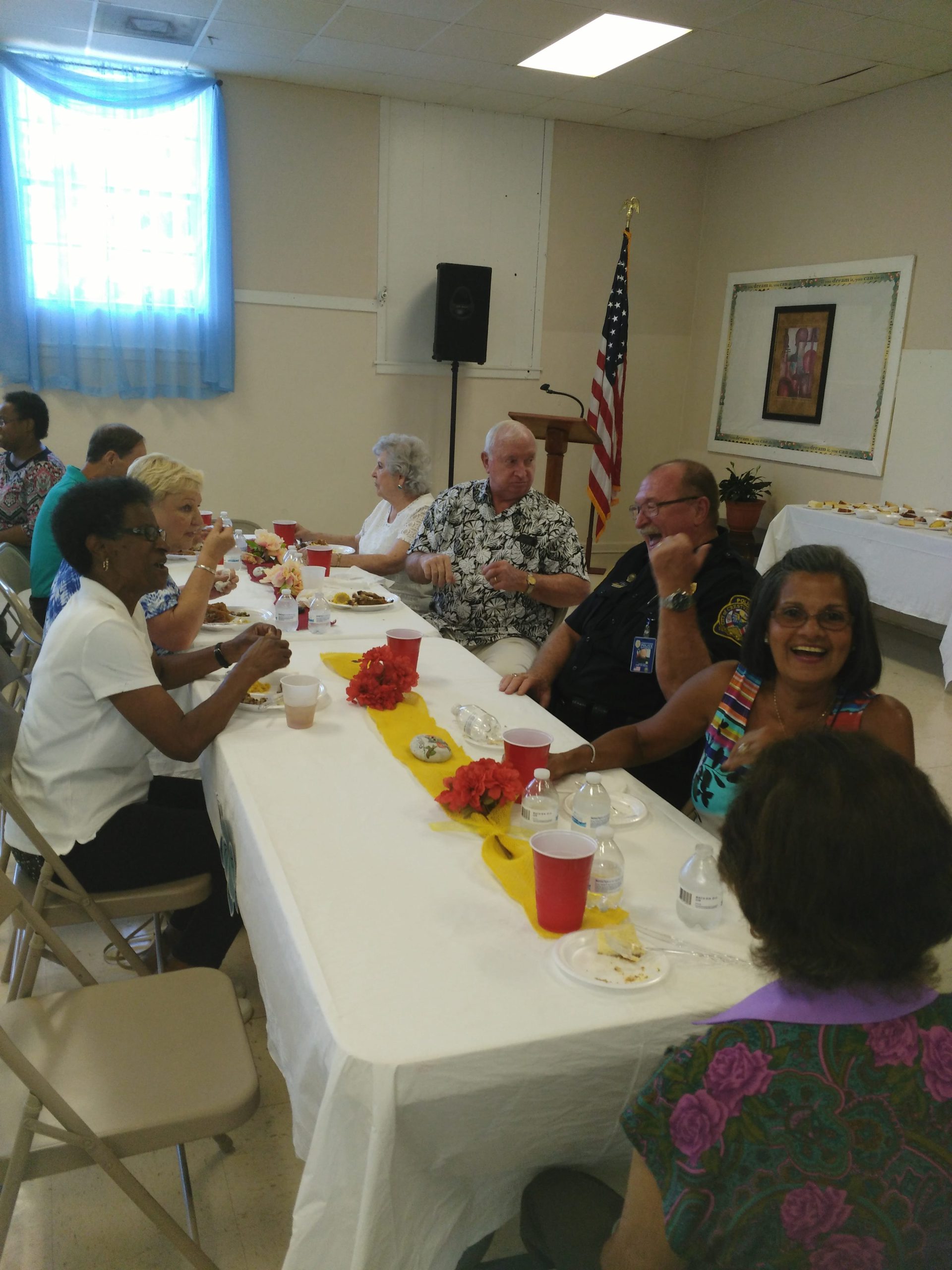 Crestview city officials and Concerned Citizens group members share a meal July 15 in Crestview. [Sara Westbrook | Special to the News Bulletin]