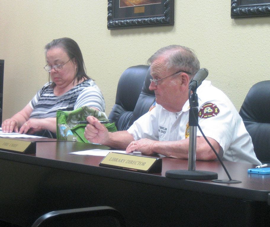 Crestview Fire Chief Joe Traylor anticipates the City Council's unanimous approval of his request to lease two new fire trucks to accommodate expected city growth. To Traylor's right is Growth Management Director Teresa Gaillard.
