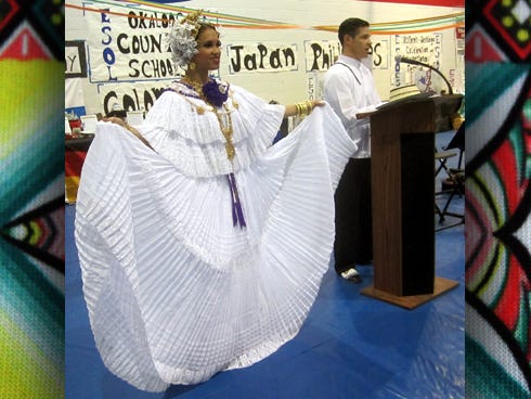 Arabhesky Chacon and Joe Kenkel model traditional Panamanian clothes before performing "El Punto," a dance native to the Central American country.