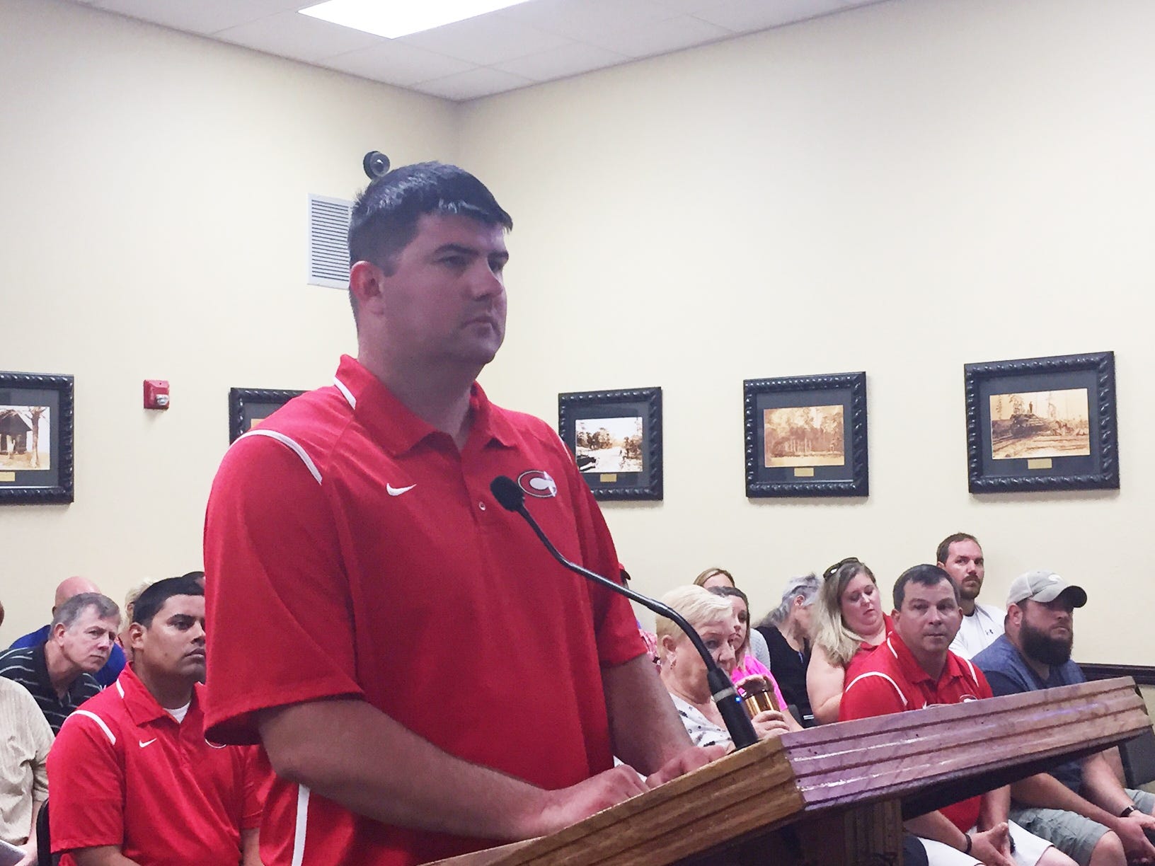 Bud Tipton, the football director of the Crestview Area Youth Association, addressing the city council. [GENEVIEVE DiNATALE | NEWS BULLETIN]