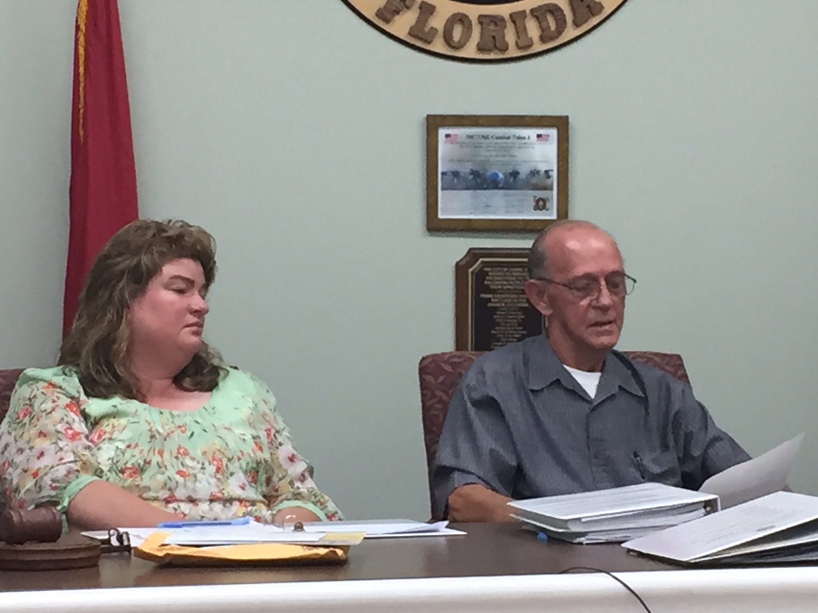 Councilmember Deborah Adams listens as Daniel Lane reads his letter of resignation. [GENEVIEVE DiNATALE | NEWS BULLETIN]