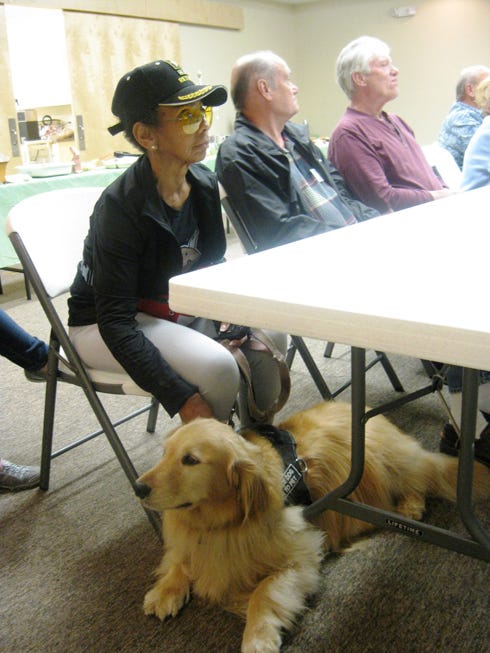 Dr. Linda Thornton — attending an Okaloosa County Master Gardeners meeting with her service dog, Siena — says two businesses turned her away because of the canine's presence.