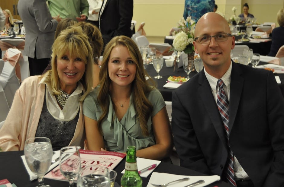 Guest speaker Diana Jordan (left) emphasized the importance of laughter to deal with life stresses and encouraged women to take better care of their health. [Renee Bell | News Bulletin]