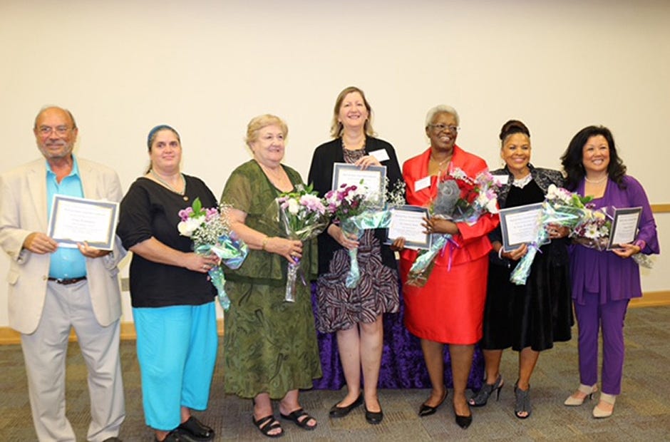 The Okaloosa County Comission on the Status of Women inducted six new members into the county Women's Hall of Fame Aug. 22 in Northwest Florida. From left are Tom Weidenhamer, Barbara Weidenhamer, Evie Fox, Brenda Shoffner, Dr. Naomi G. Barnes of Crestview, Dr. Karyn M. Combs and Tammy McDaniel.
