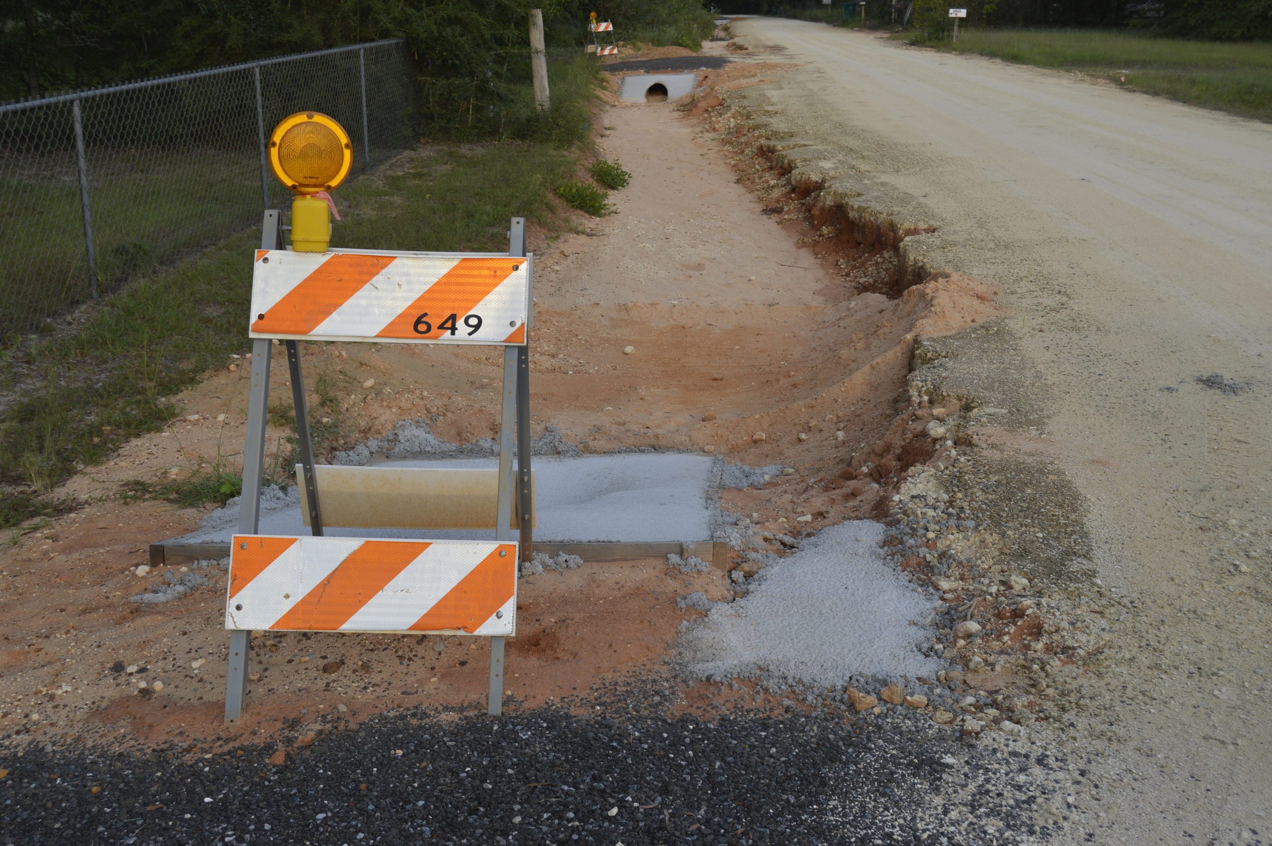 This week, county workers will complete Locke Lane in North Crestview, where they repaired culverts and applied dirt-to-surface stabilization to improve performace and strengthen the dirt road. [ALICIA ADAMS | News Bulletin]