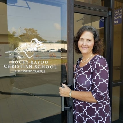 Rocky Bayou Christian School Principal Denise Bowers said the best part of her day is greeting students first thing in the morning at the Crestview campus, which opened its doors in August after a year of preparation. [Special to the News Bulletin]