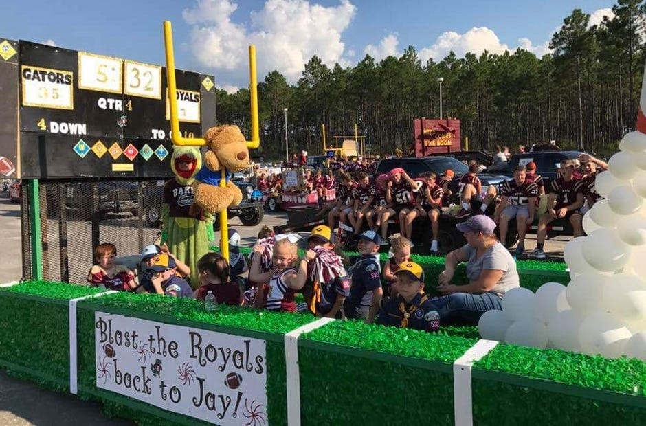 Cub Scout Pack 532 of Holt's football-themed float took second place in Baker's homecoming parade festivities. [SPECIAL TO THE NEWS BULLETIN]