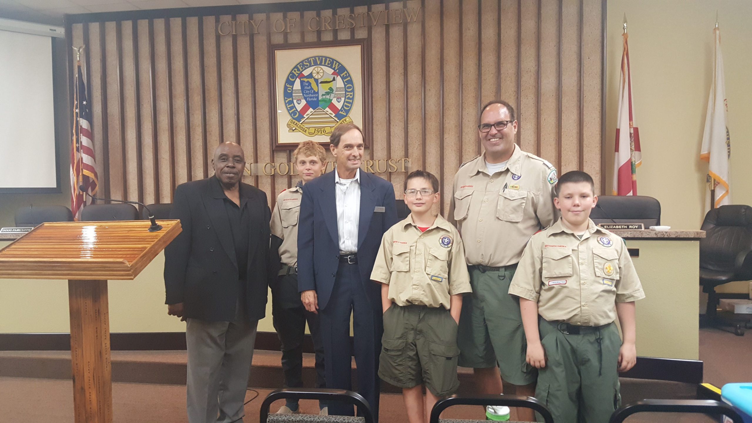Councilmen Shannon Hayes and J.B. Whitten visit with local boy scouts Kenny Mayfield, Isaac Collins, Bryan Justiss and their troop leader John Mayfield during City Hall's open house. [ALICIA ADAMS | News Bulletin]