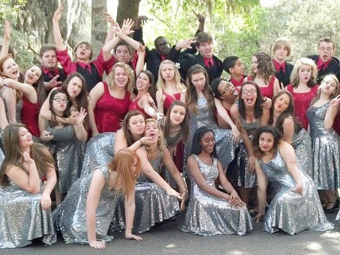 Crestview High School Chanticleer and Destiny show choirs give playful poses at state competition in Jacksonville.