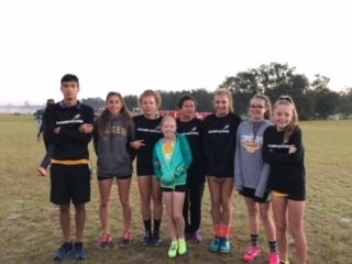 Baker's cross country team is, from left: Greg Chaitha, Allison Morse, Gabi Espinosa, Karley Bishop, Maya Espinosa, Julia Knight, Eliana Butler, and Maci Bussanmus. [SPECIAL TO THE NEWS BULLETIN]