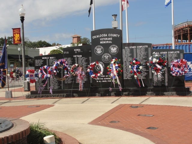 Wreaths are on display at the Okaloosa Veterans Memorial in downtown Crestview. [SAMANTHA LAMBERT | News Bulletin]
