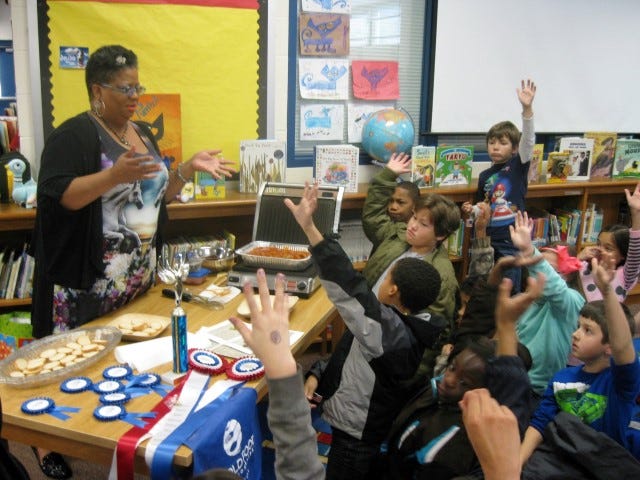 Crestview competitive chef Sherri Williams gets Northwood Arts and Science Academy third-graders excited about making Cougars Meatball Sliders.