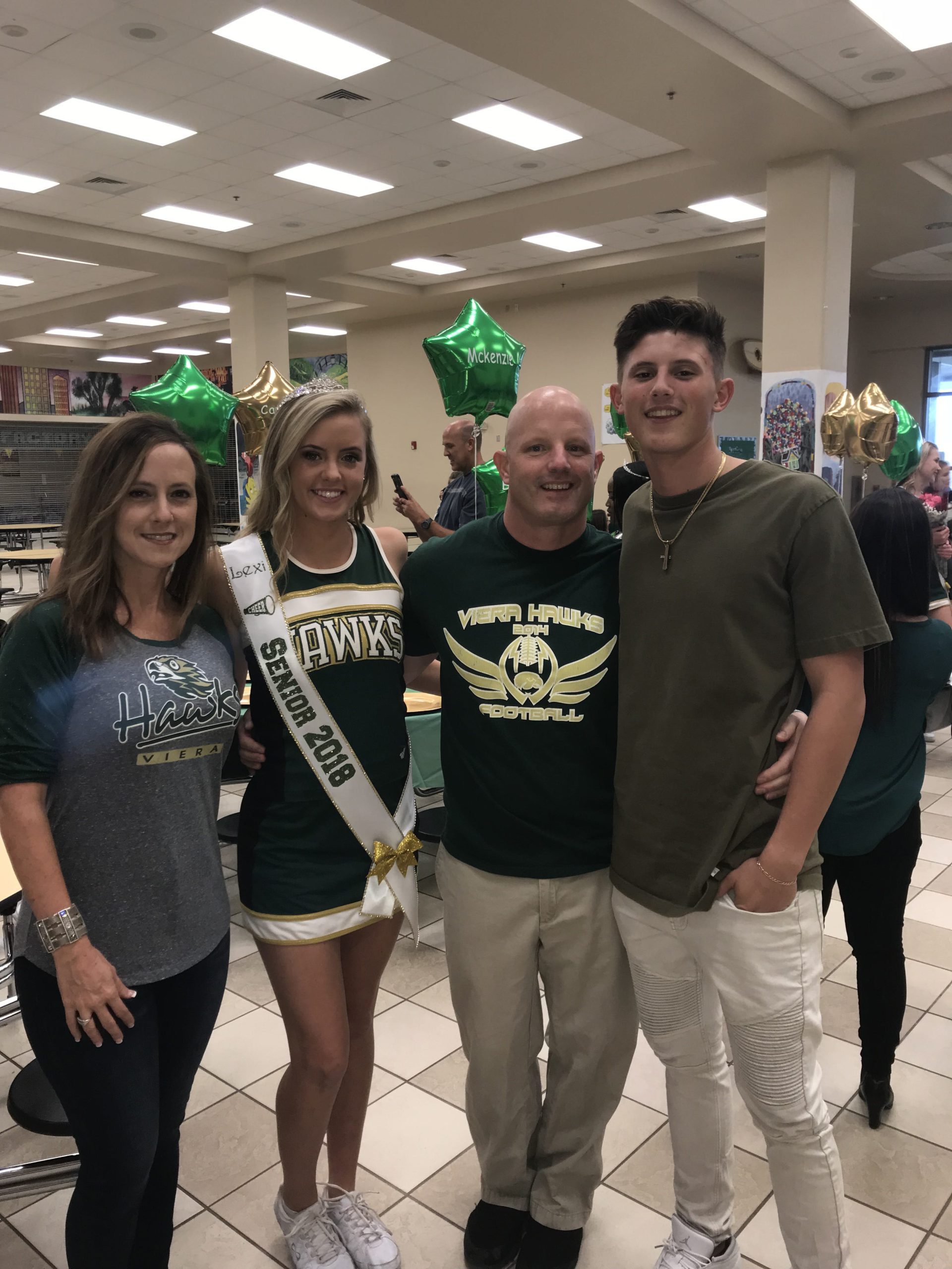 Stacey, Lexi, Shawn, and Carter celebrate the Viera High School cheerleaders' Senior Night. [SPECIAL TO THE NEWS BULLETIN]