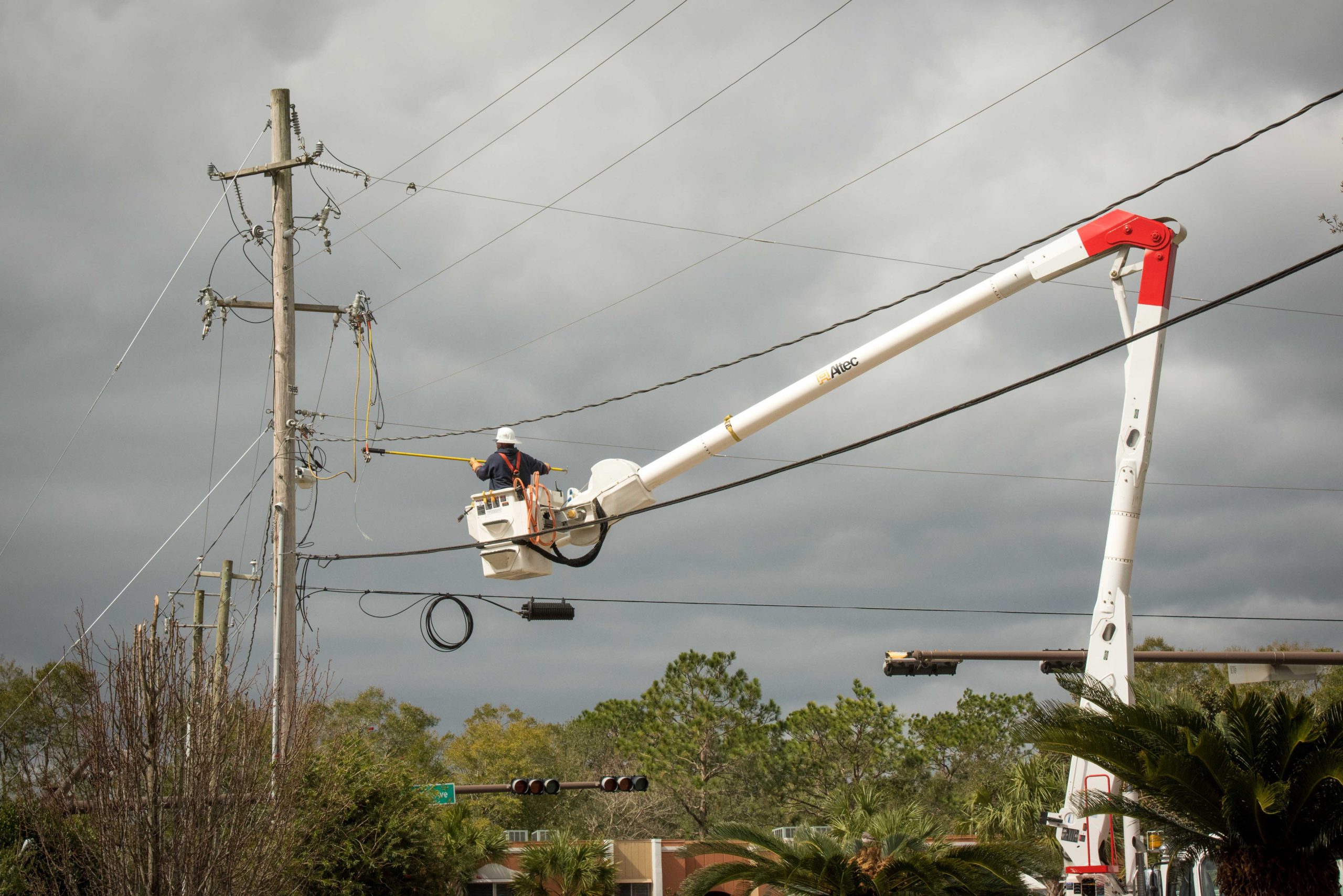 Gulf Power crews restore power in Pensacola. [Special to the Press Gazette]