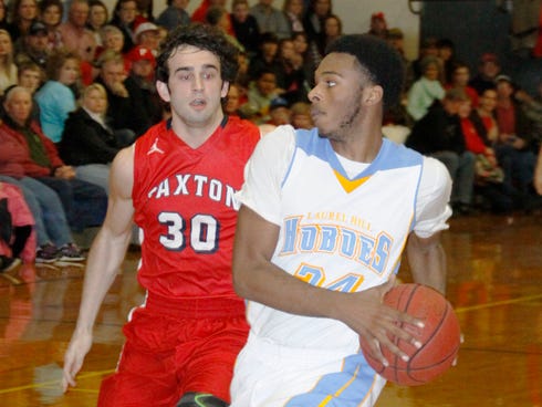 Laurel Hill School's Bryson Cooper drives the lane against Paxton. Hobo Coach Kent Zessin says Cooper, a junior, has the potential to do big things at the college level.