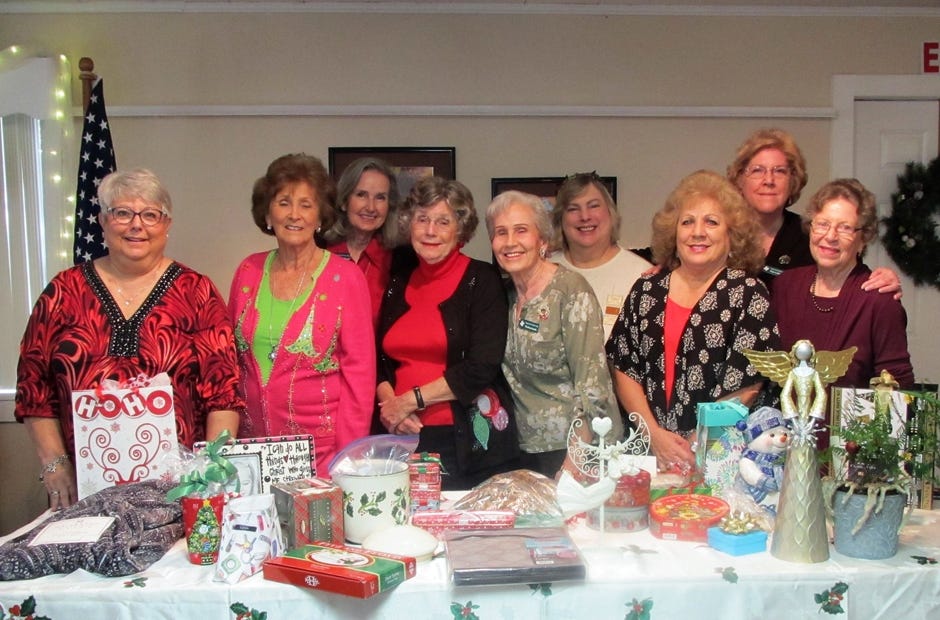 Dogwood Garden Club members are pictured during their annual Christmas auction. From left are Ruth Herington, president; Judy Rice; Celia Broadhead, treasurer; Beach Campbell; Thelma Smith, Posey Pal chair; Janice Crose, chaplain; Mary Jo Thomas; Pam Callahan, first vice president; and Sarah Petty, Wings & Things chair. [SPECIAL TO THE NEWS BULLETIN]