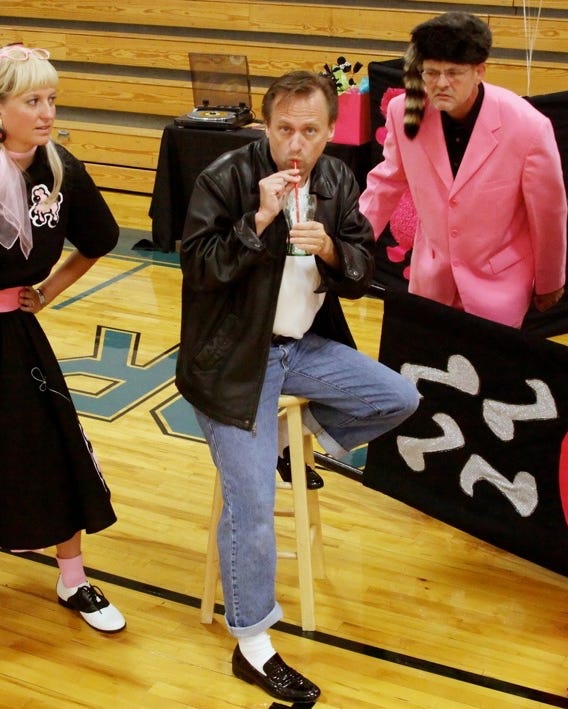 Act4Mystery's “Bebopped at the Sock Hop” features the characters, from left to right, Patsy DeCline (portrayed by Heidi Best-Swift), Melvin Delvis (Ken Olson) and Barry Contrary (Chris Manson). [PHOTO BY PAULA HILTON]