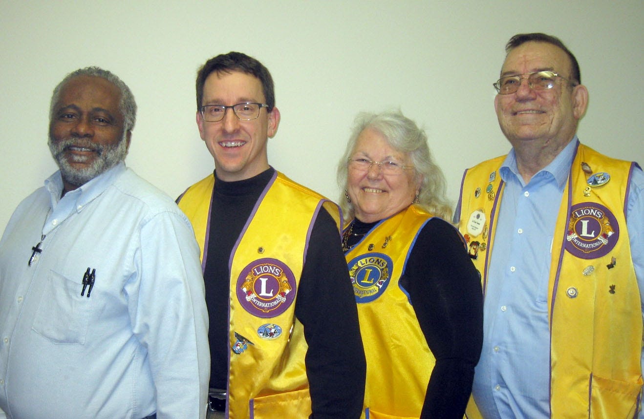 Edward Mitchell Jr., Chris Howard, and Charlotte and Lou Jones (from left) and their fellow Crestview Lions Club members are committed to helping community residents with vision care and other needs. [RENEE BELL | News Bulletin]