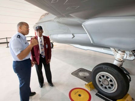 Lt. Col. Maurice Lee, commander of the 33rd Aircraft Maintenance Squadron, gives Tuskegee Airman Lt. Col. (retired) James Harvey a tour of one of the 33rd Fighter Wing’s F-35s at Eglin Air Force Base on Monday afternoon. Harvey started his Air Force flying career in the P-47 in 1944 and later flew the F80 during the Korean War, becoming the Air Force’s first black jet pilot to fly in Korean airspace.