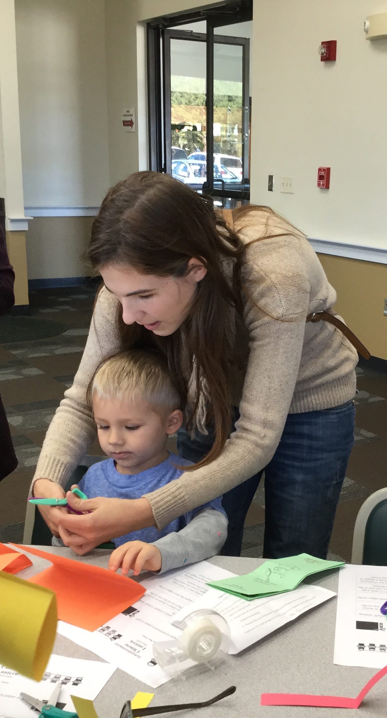 Nathan Smith, age 3, makes a Chinese lantern with a little help from his mother, Ashley Smith, at Library Class Jan. 30 in Crestview. They are Laurel Hill residents. [SPECIAL TO THE NEWS BULLETIN]