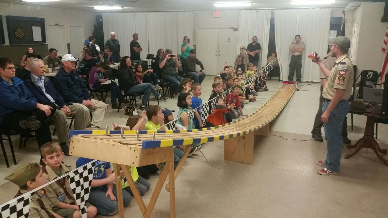 Pinewood Derby participants and their families listen to a speaker during Saturday's event. (SPECIAL TO THE NEWS BULLETIN)