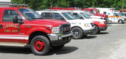 North Okaloosa County fire districts' command, response and rescue vehicles line up at the scene of a mutual training program in June 2015. Shared resources and training would be commonplace under a consolidated North Okaloosa fire department, officials say.