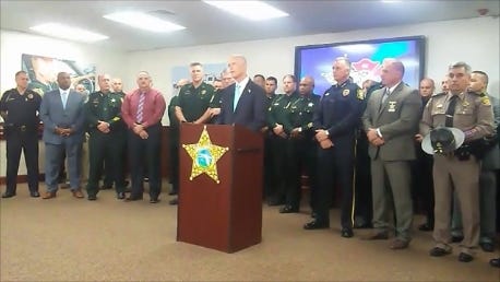 Governor Rick Scott unveils his $500 million school safety plan at the Walton County Sheriff's office Feb. 28. [AARON JACOBS | NEWS BULLETIN]