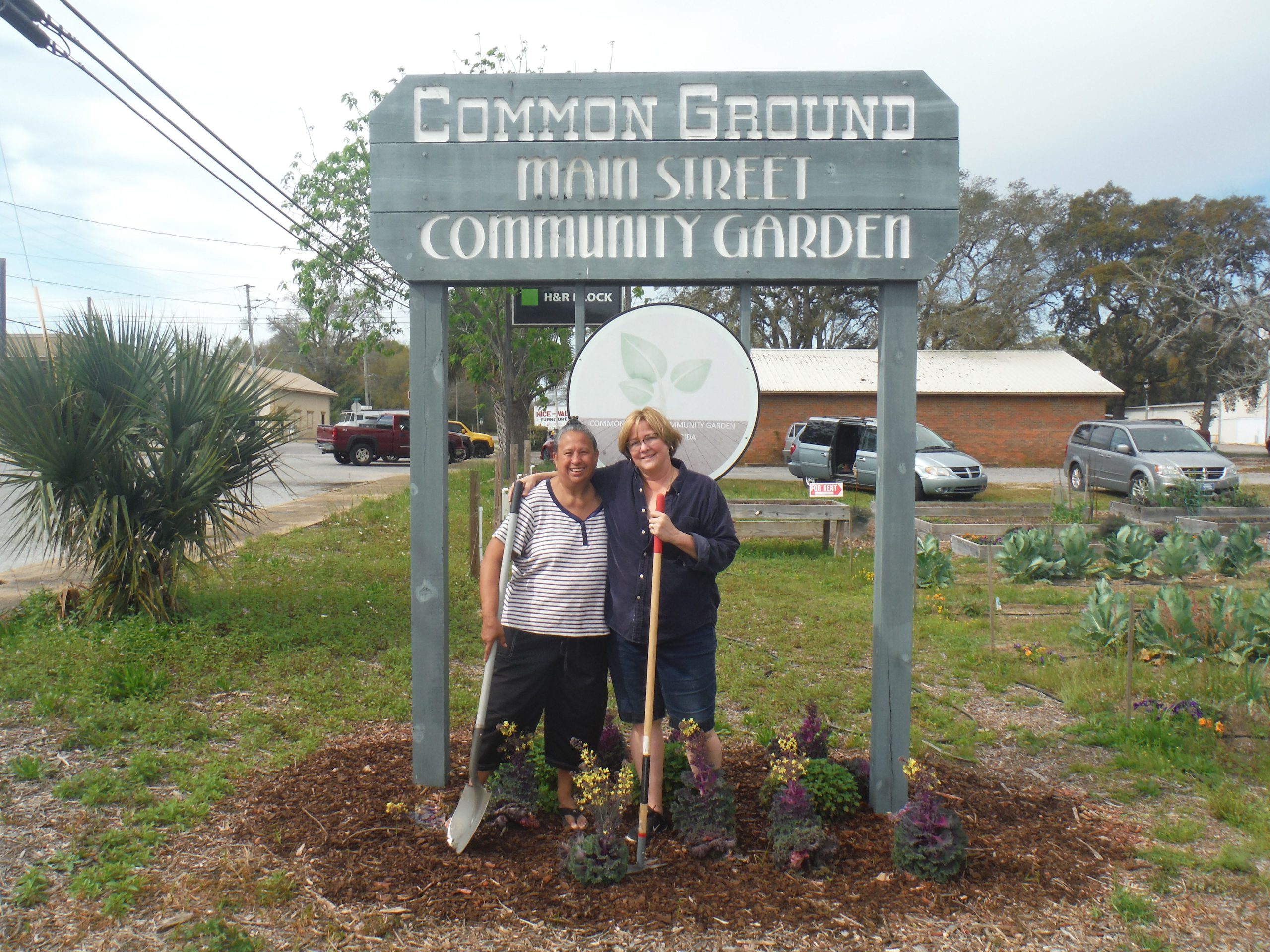 Esther Phelps (left) and Cathy Ward pose for a photo a the Common Ground Community Garden. [AARON JACOBS|NEWS BULLETIN]