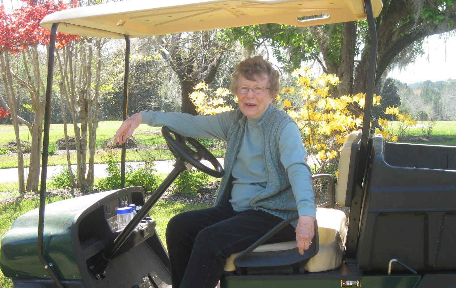 Sarah Petty, an Okaloosa Master Gardener, said her motorized wheelbarrow is one of the best tools in her arsenal. "I couldn't do much of the gardening without (it)." [RENEE BELL | NEWS BULLETIN]
