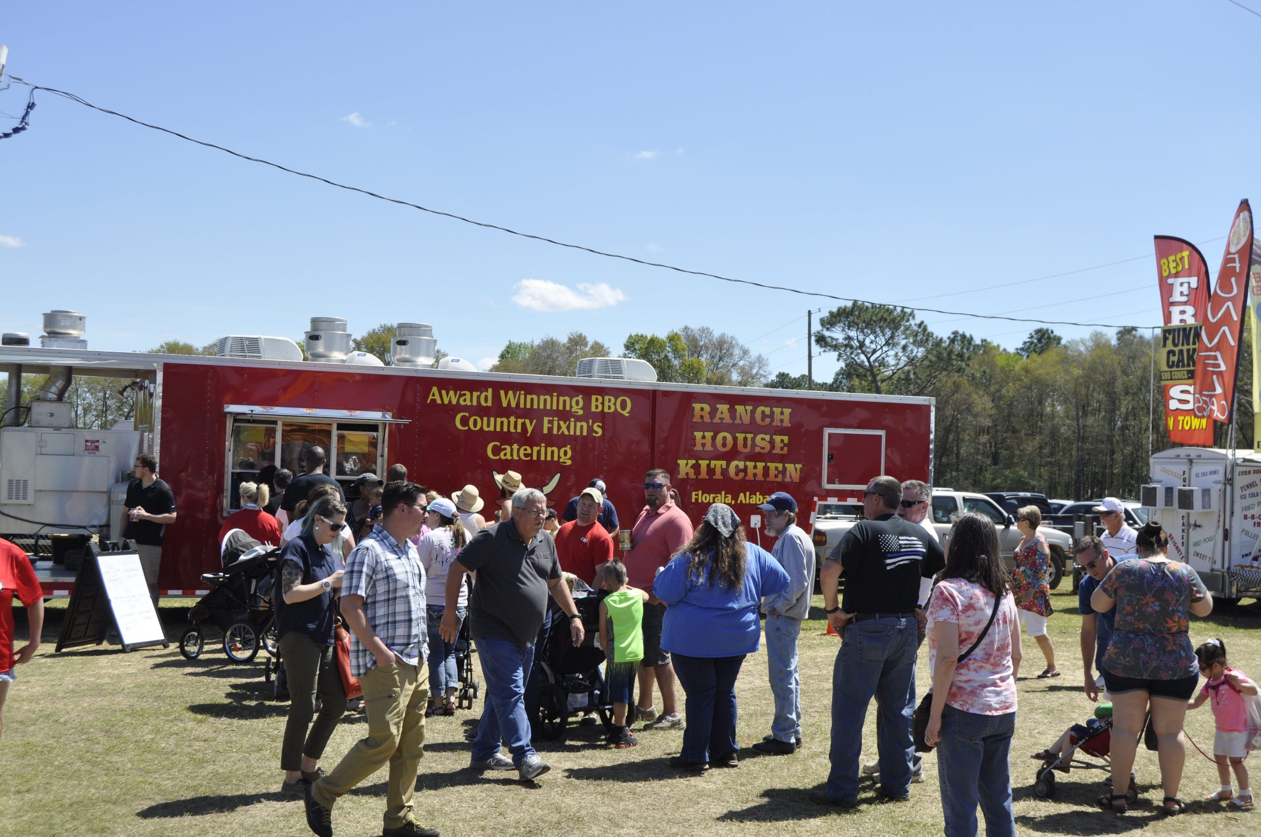 Triple B attendees line up to get some barbeque at Ranch House Kitchen. Ranch House took home four awards, including Grand Master Champion. [AARON JACOBS|NEWS BULLETIN]