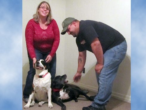 Their house may lack furniture, but it feels more like home now that Courtney and Aaron Huffstutler have reunited with Belle and Buster, their dogs who escaped soon after they moved to Crestview.