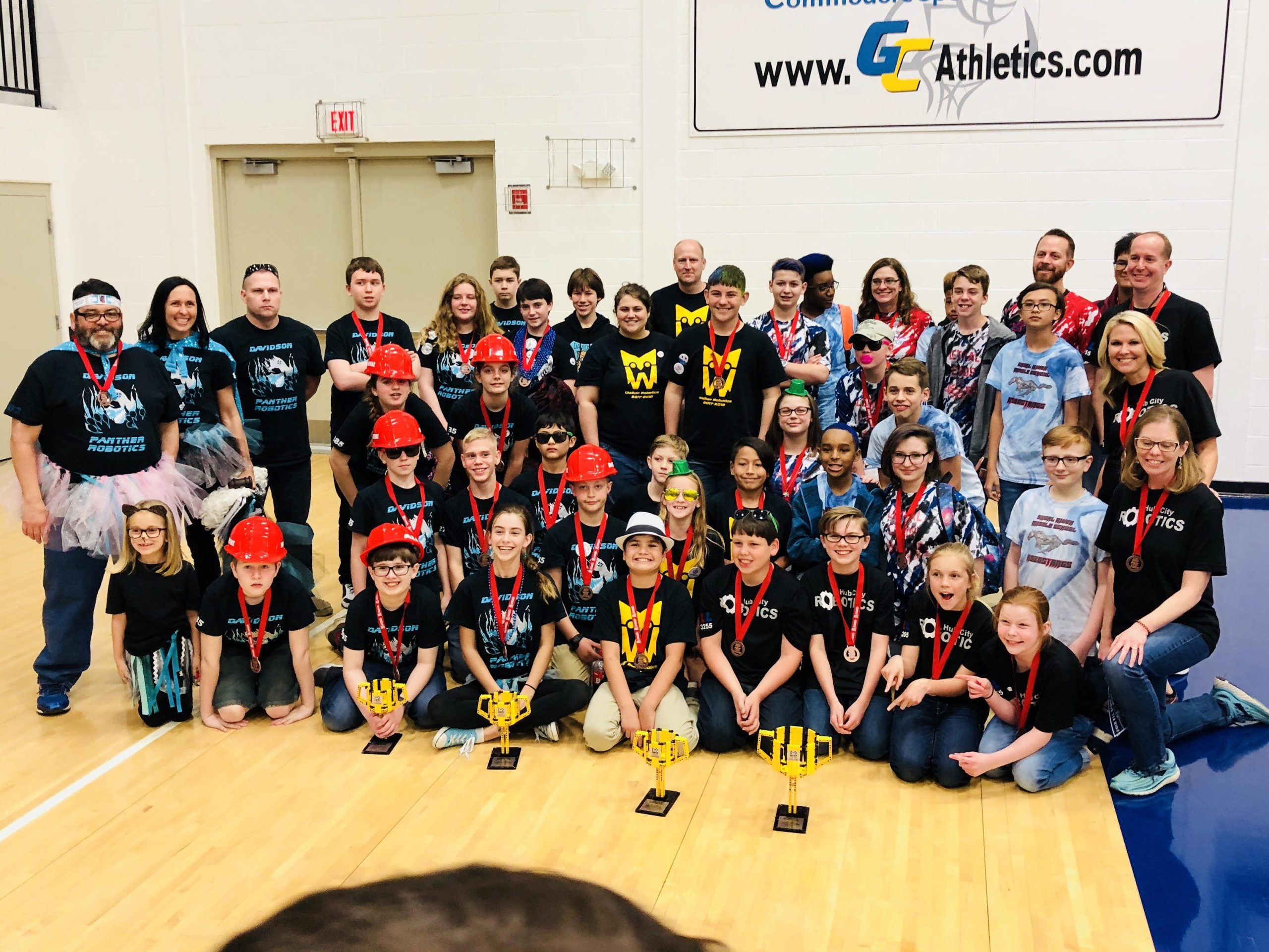 Crestview robotics teams that competed at the Northwest Florida Regional FLL Tournament in Panama City pose for a group picture. Teams from Shoal River Middle School, Davidson Middle School, Walker Elementary School and the Hub City Robotics team are pictured. [SPECIAL TO THE NEWS BULLETIN]