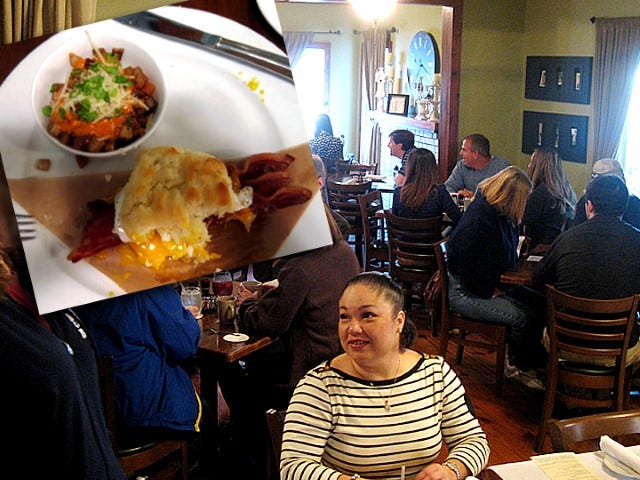 Patrons attending The Wild Olive's breakfast menu debut raised $2,600 for the Boonstra mission in Kenya while savoring Chef Joseph McDuffie's creations such as “The Gus,” consisting of apple-wood-smoked bacon, a fried egg, cheddar cheese and apple butter on an oversized buttermilk biscuit. Breakfast sandwiches are served with a choice of smoked gouda grits or, as seen here, home fries with a dabble of aioli sauce.