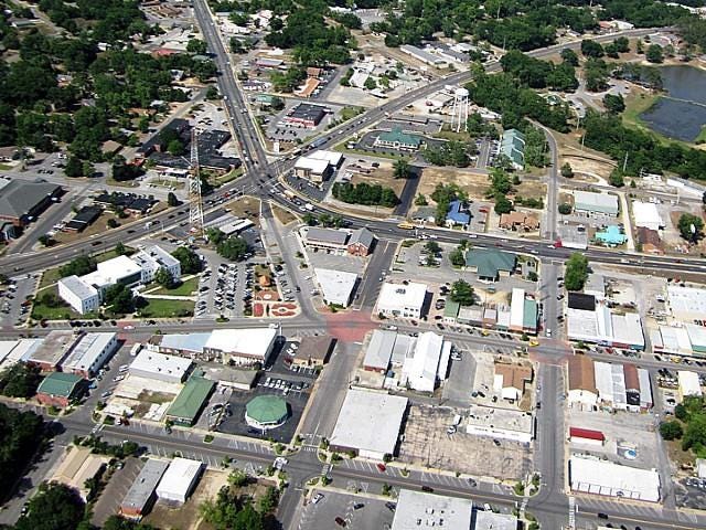 The Community Redevelopment Agency district encompasses downtown Crestview, shown in this aerial photo. State Road 85 is roughly horizontal in this photo, intersecting with U.S. Highway 90 near the center left. Main Street is below S.R. 85. The county courthouse is on the left. [BRIAN HUGHES|NEWS BULLETIN]