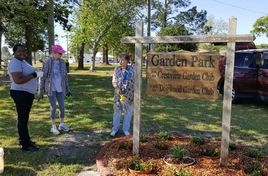Jornell Taylor, Celia Broadhead and Beach Campbell recently did some gardening at Garden Park in Crestview. [SPECIAL TO THE NEWS BULLETIN]